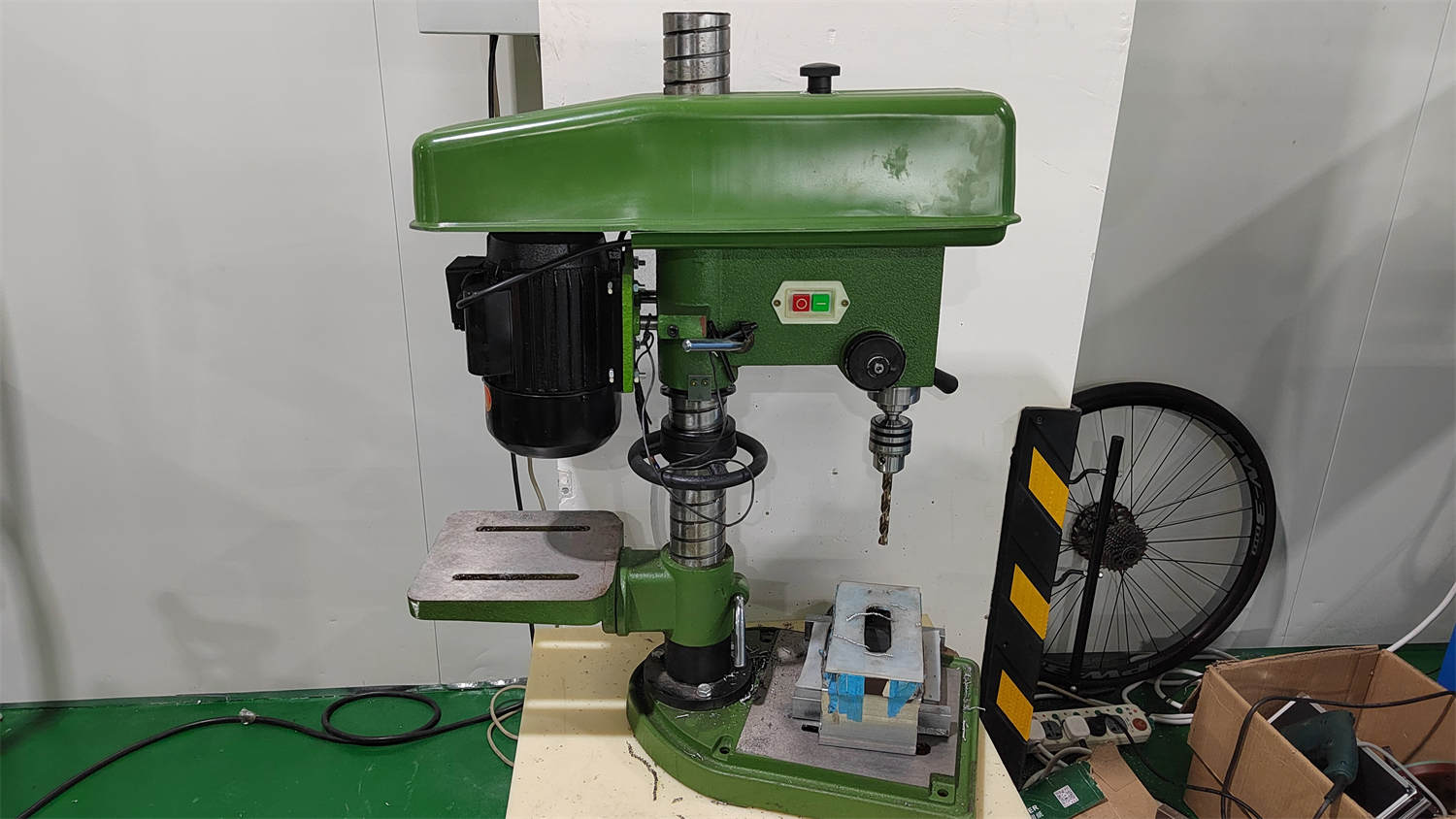 Bench drill station in the production workshop